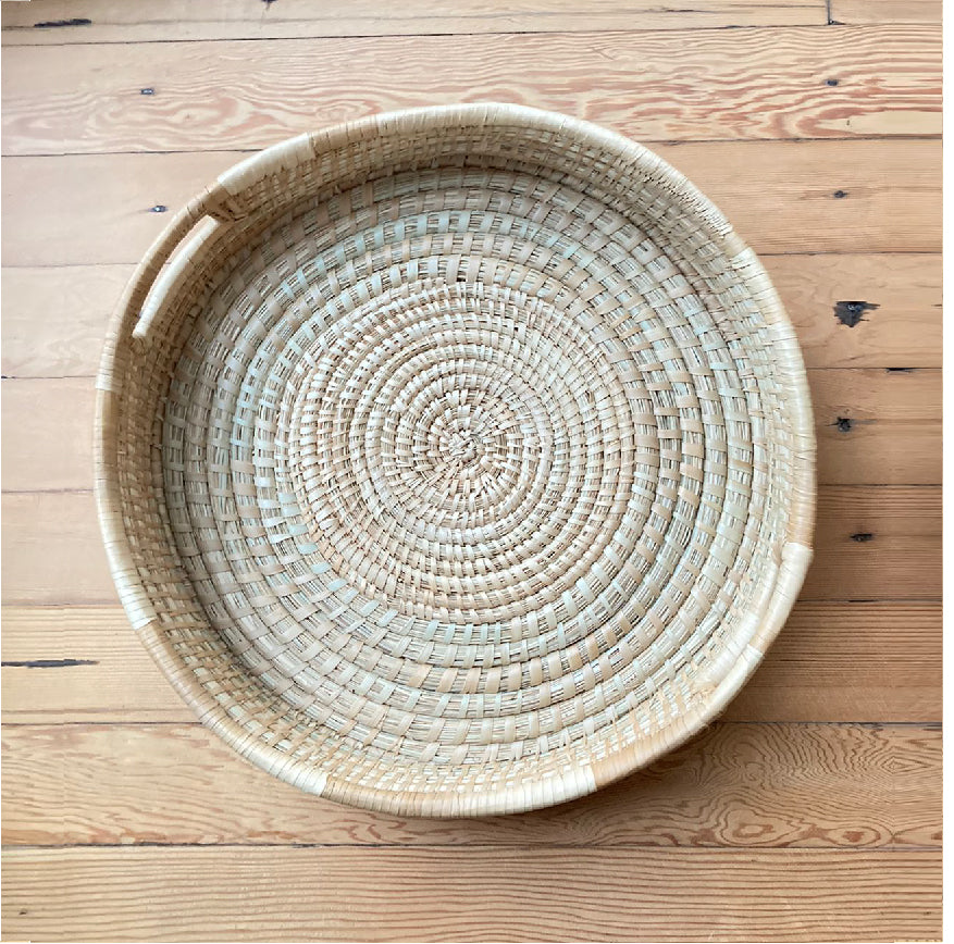 Small circular shallow woven basket